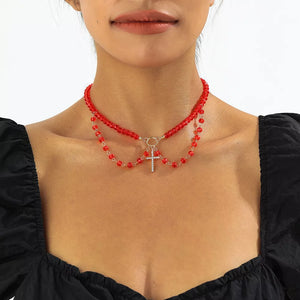 necklace in red featuring beaded and layered fit
