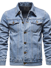 Light wash denim trucker jacket with classic fit, button front, and chest pockets.
