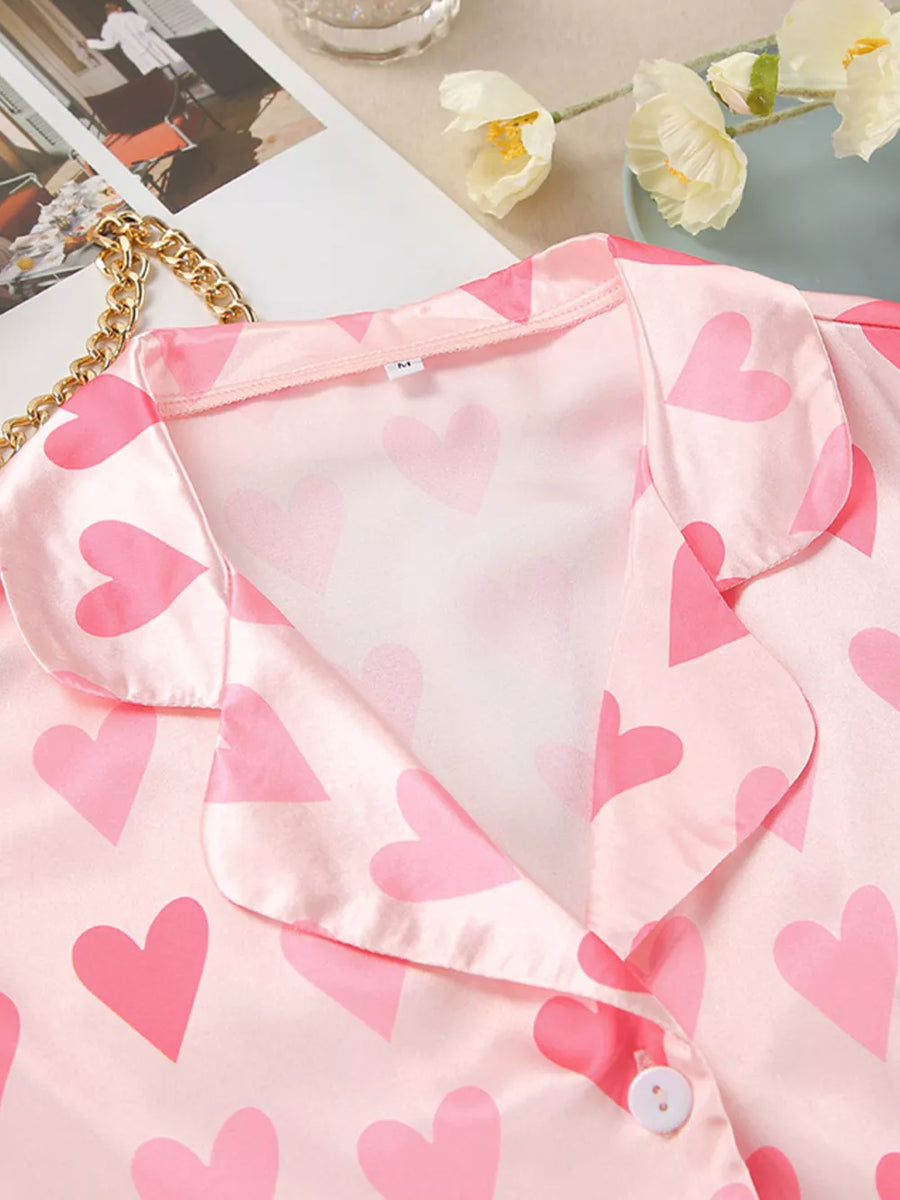 pajama set featuring heart-print in fuchsia with 95% polyester, 5% elastane Care instructions: Machine wash cold texture