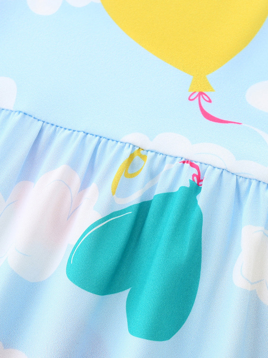 Baby dress with balloon print, ruffled waist, and cloud pattern on blue fabric.