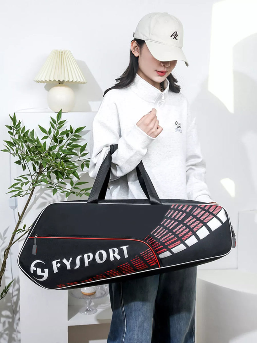 Black nylon sports equipment bag with red and white graphic detail and FYSPORT logo