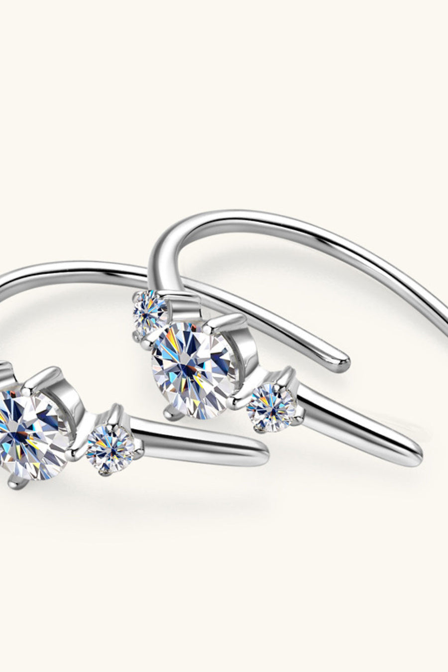Silver ear climbers with sparkling diamonds in a celestial design