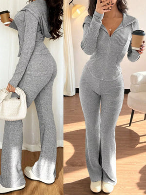 Light gray ribbed zip-up hooded set with flared pants.
