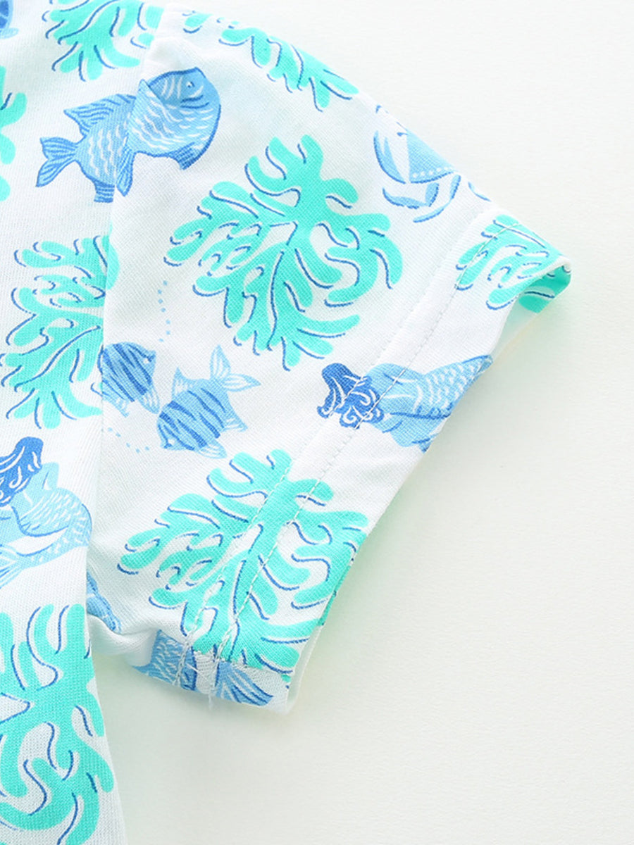Toddler cotton dress with blue fish and coral print, short sleeves.