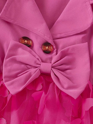 Pink baby dress with collared neckline, bow, and butterfly applique tulle skirt.