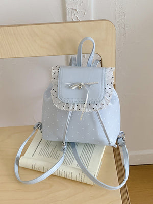 backpack in white with polka-dot and lace trim