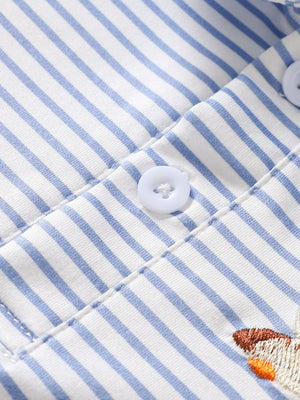 Light blue striped cotton polo with embroidered duck detail and white buttons.