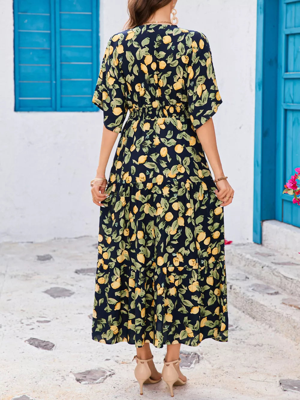 Lemon leaf print midi dress in Black Forest with V-neck, short sleeves, elastic waist, and tiered skirt.