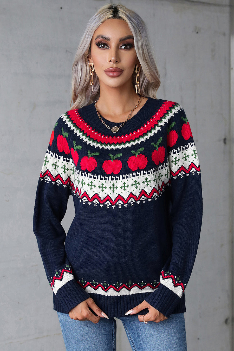 Dark blue acrylic sweater with festive Fair Isle apple motif, crew neck, long sleeves.