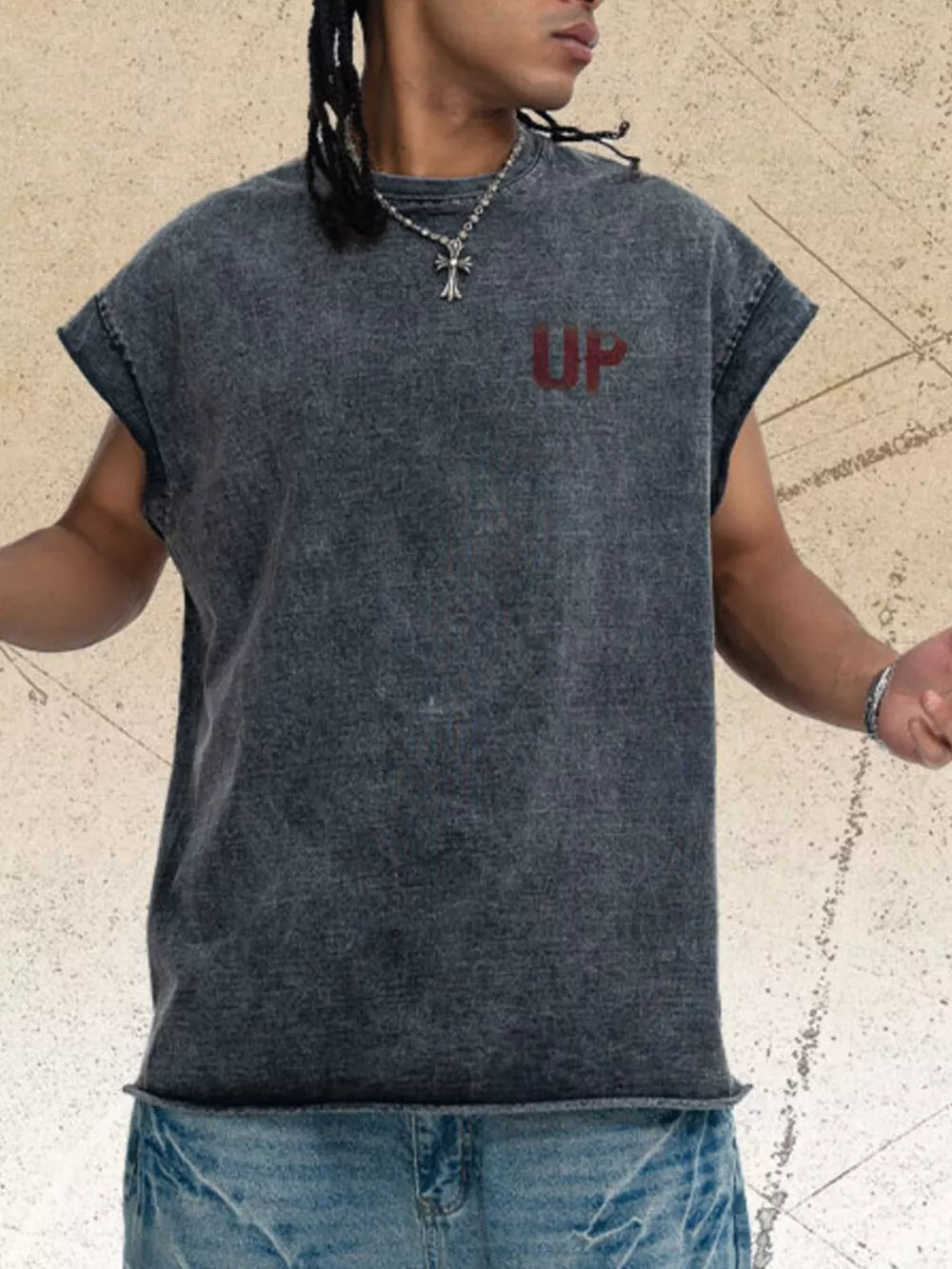 Men's dark gray acid-wash graphic tank top with raw hem and distressed details.