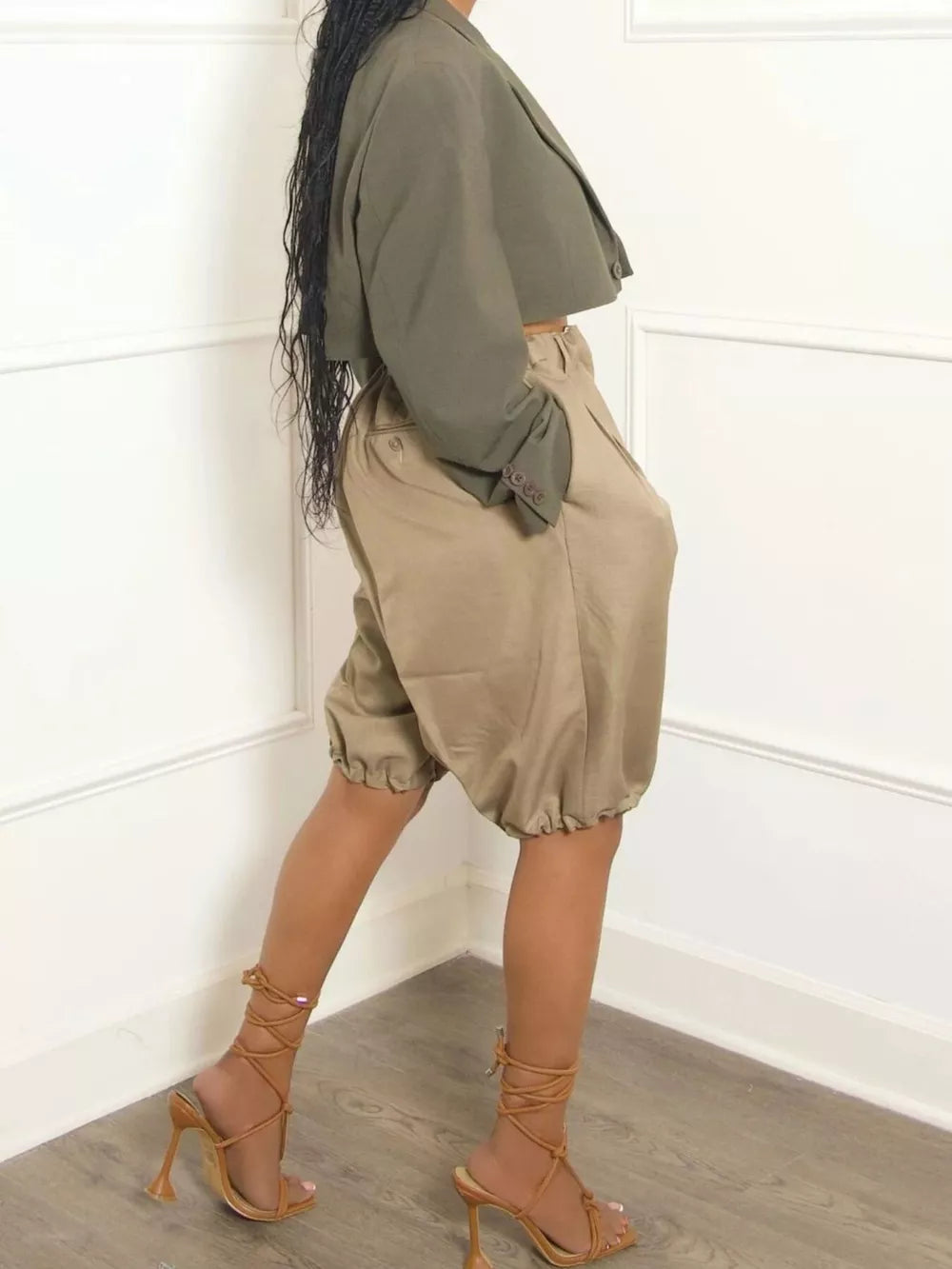 Khaki pleated high-waisted shorts with drawstring and balloon leg detail