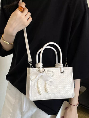 crossbody bag featuring geometric in sky blue with PU Leather Imported Size &amp texture