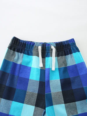 Baby blue plaid shorts with elastic waistband and white drawstring