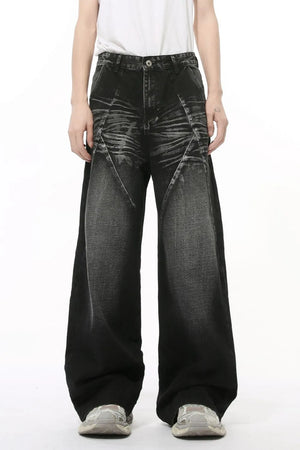 Dark wash denim jeans with wide legs and sculpted panel details.