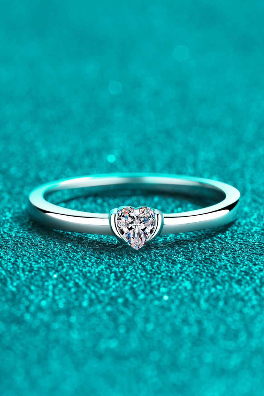 Silver ring with a heart-cut solitaire diamond engagement ring