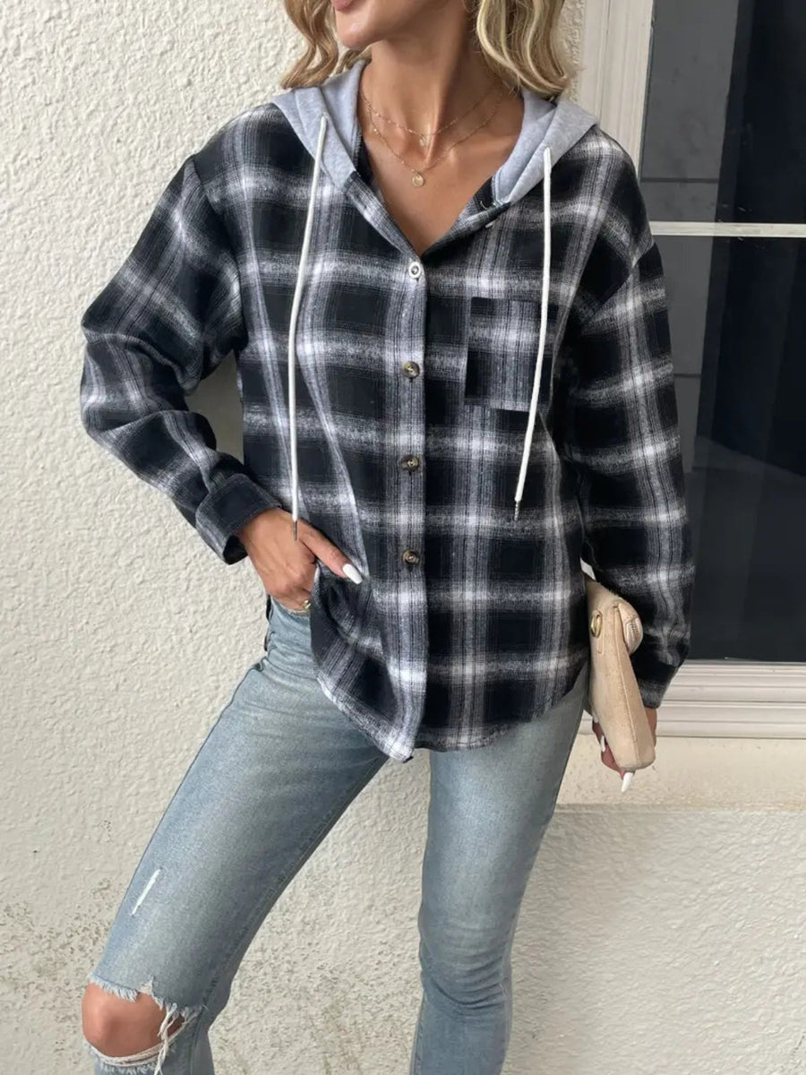 Plaid shirt jacket with contrast hood in black and white, featuring button front and white drawstrings.
