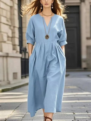 midi dress in light blue featuring ruched and A-line fit