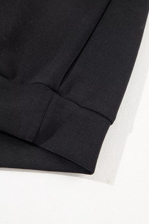 50% polyester, 45% viscose, 5% elastane Care instructions: Machine wash cold sweatshirt and sweatpants set in black with