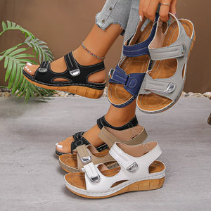 Sleek adjustable wedge sandals in black, dark blue, apricot, gray, and white with comfortable fit.