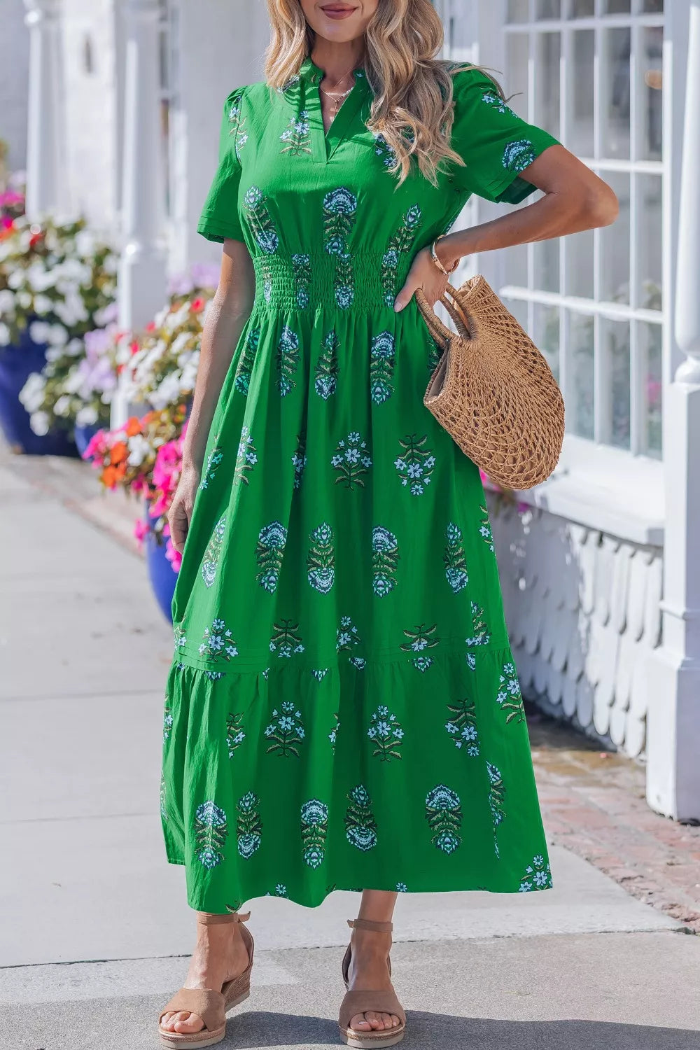 Green floral maxi dress with smocked waist and tiered skirt