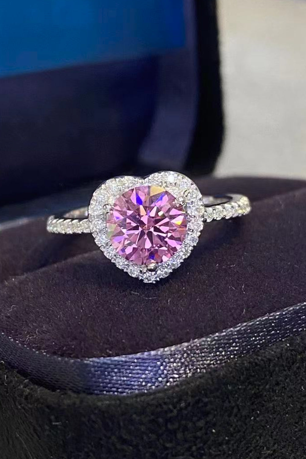 Pink moissanite heart halo ring with pave band