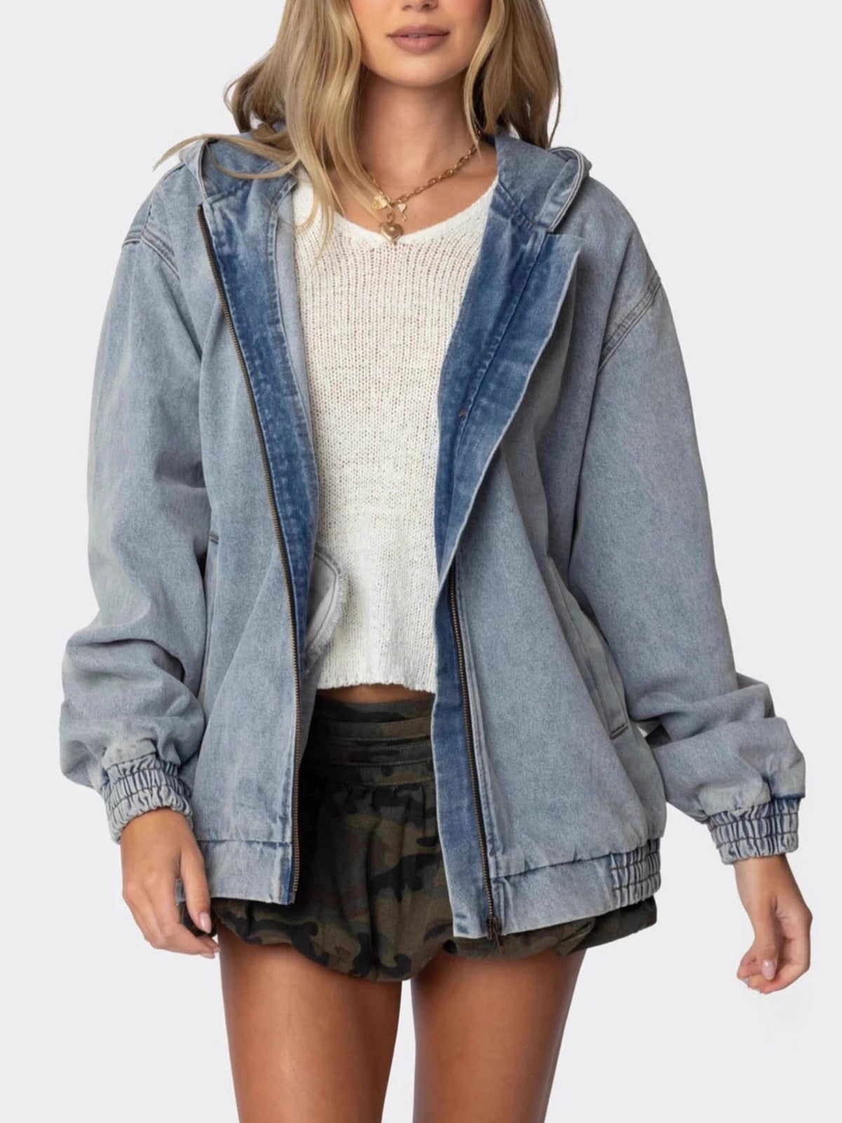 Light wash denim hooded oversized jacket with zip front and elastic cuffs