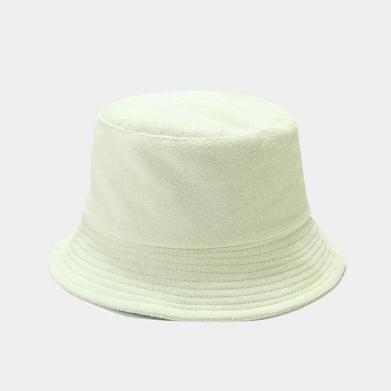 hat in mint green featuring ribbed brim and bucket fit