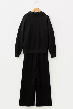Black collared V-neck sweatshirt and wide-leg pants pajama set.