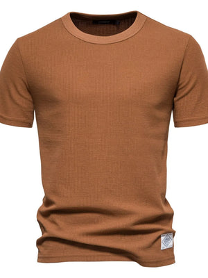 Textured crew-neck t-shirt in Caramel with a waffle knit and a small logo tag.