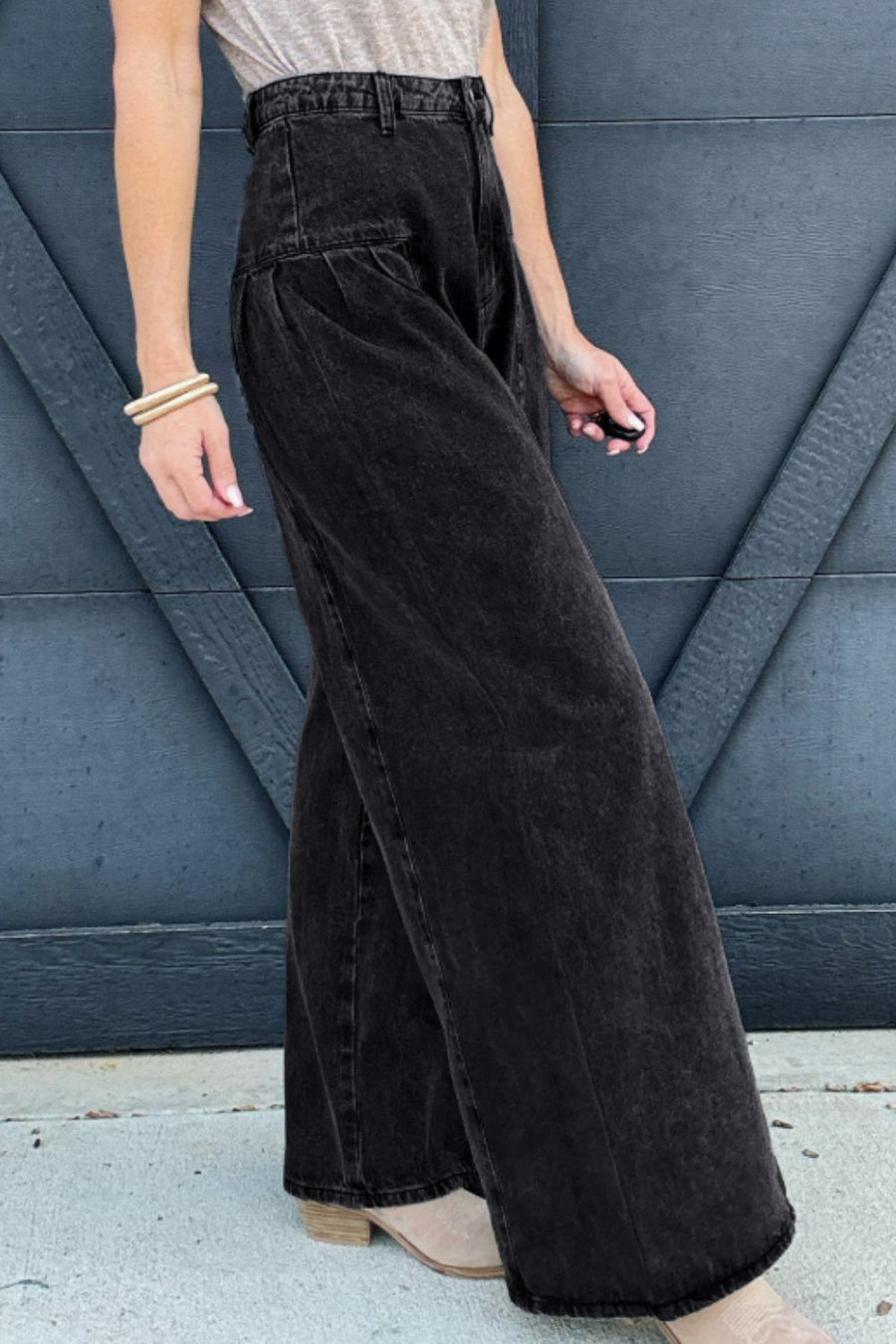 Black pleated front palazzo jeans with a wide leg