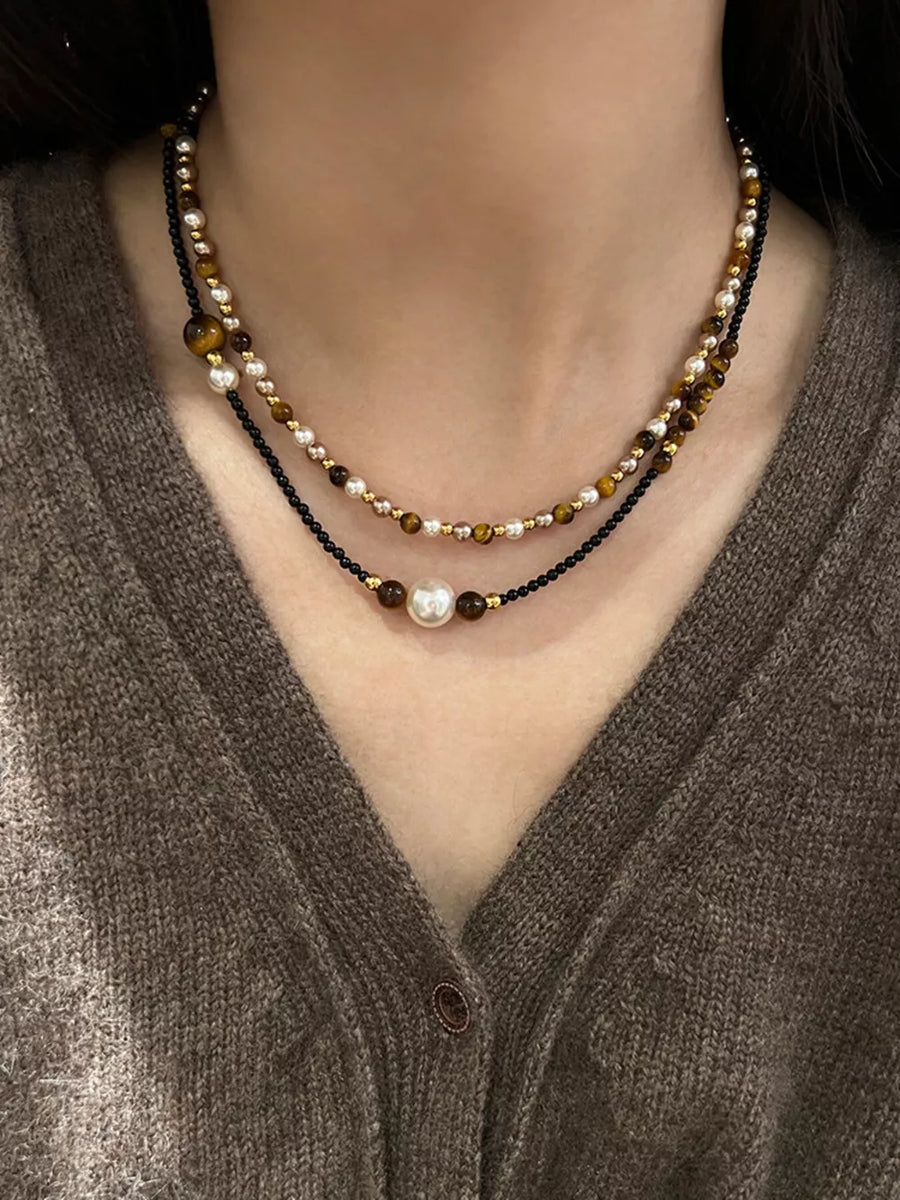 Elegant Tiger Eye Layered Necklace with pearl and gold beads, black chain
