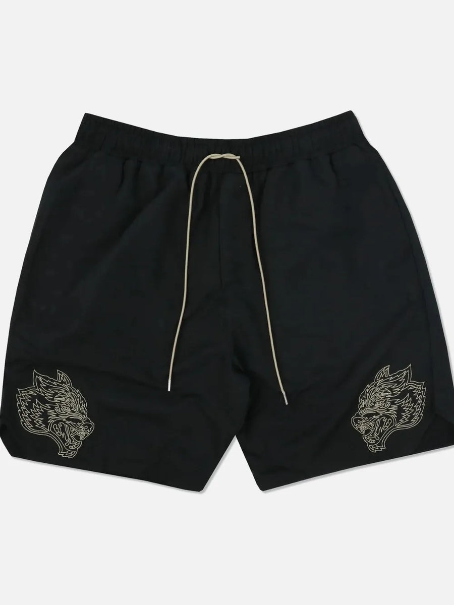 Black performance shorts with embroidered wolf heads and a drawstring waist.