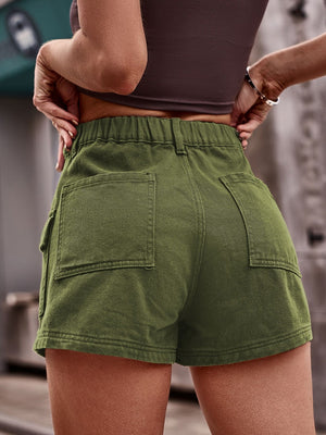 Cargo denim high-waist shorts in matcha green with elastic waistband and back pockets.