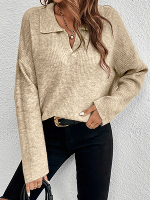 pullover sweater in light beige featuring ribbed and relaxed fit