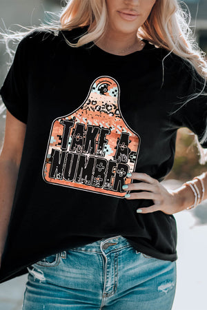 Black graphic tee with Take A Number design on a tag shape