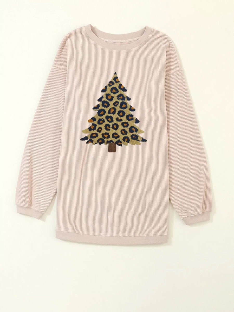 Eggshell corded sweatshirt with leopard print Christmas tree graphic.