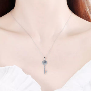 925 sterling silver,Moissanite Carat weight: 1ct Care instructions: Avoid wearin necklace in clear with key shape silhouette