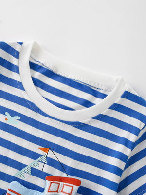 Children's blue and white striped short sleeve tee with boat applique detail.