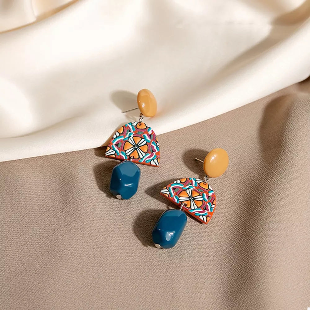 earrings in orange featuring drop design and drop fit