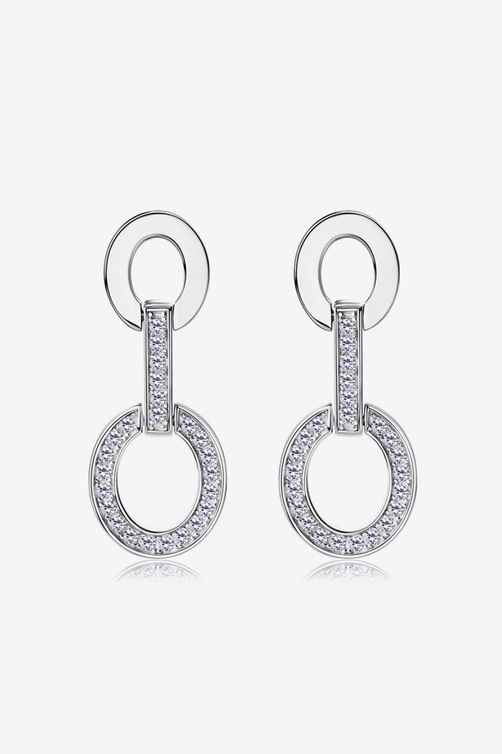 Geometric pavé drop earrings in silver with interlocking circles and crystal embellishments.