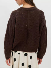 100% polyester Care instructions: Machine wash cold cardigan in Brown with relaxed silhouette