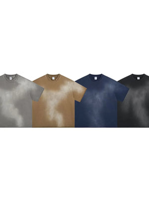 Acid wash boxy tee in black, navy, camel, and grey with raw seams.
