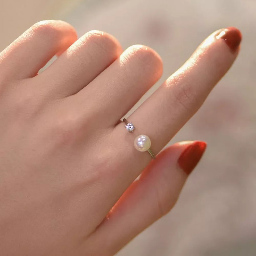 Freshwater Pearl,925 sterling silver,Zircon Care instructions: Avoid wearing dur ring in white with open band silhouette
