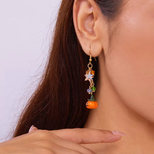 orange earrings featuring asymmetrical and novelty