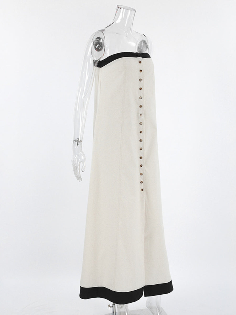 Beige cotton blend tube maxi dress with button front and black trim detail.