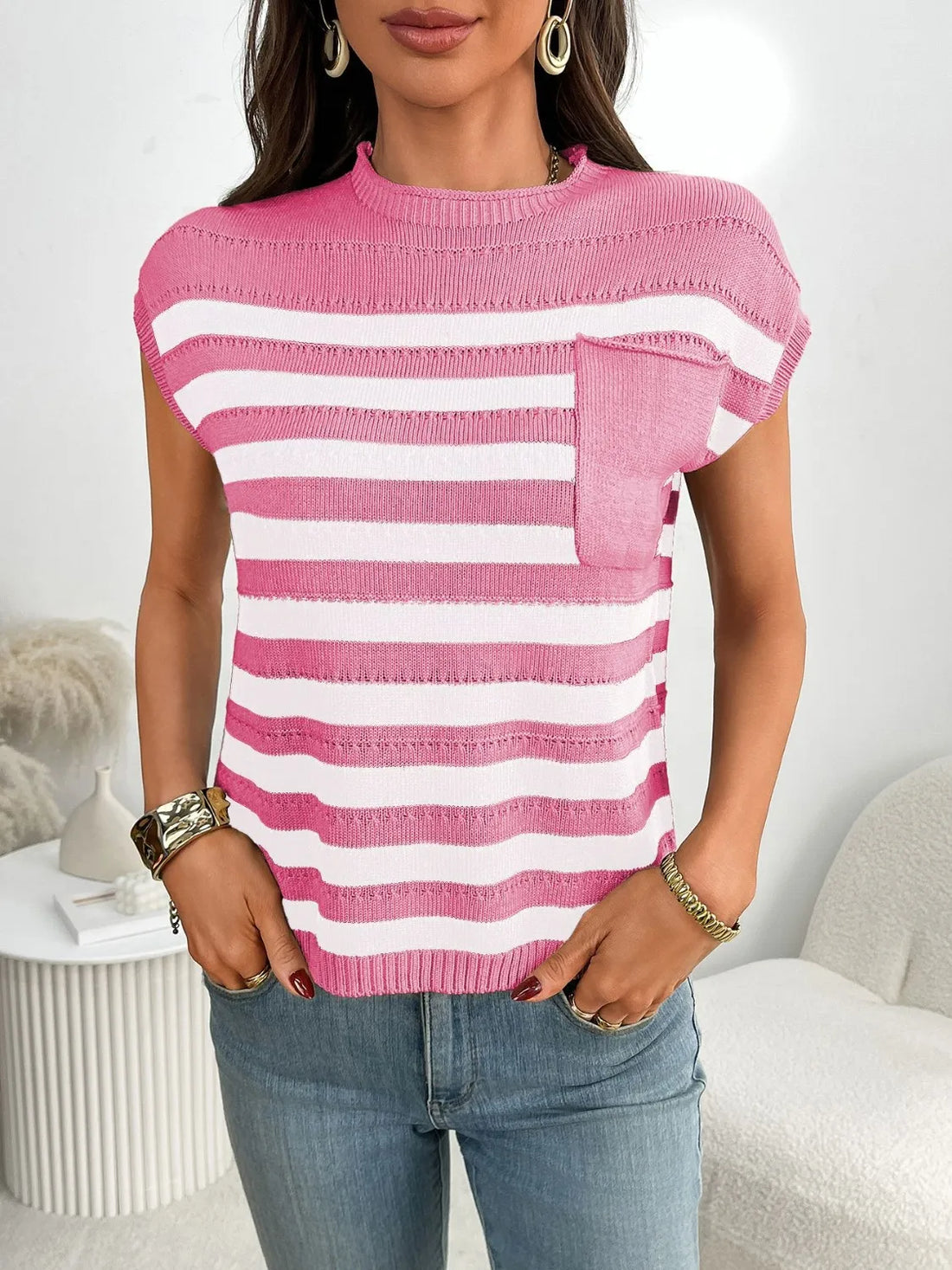 Striped knit pocket tee in blush pink and white with short sleeves and a crew neck.