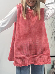 sweater vest in coral pink featuring openwork and relaxed fit