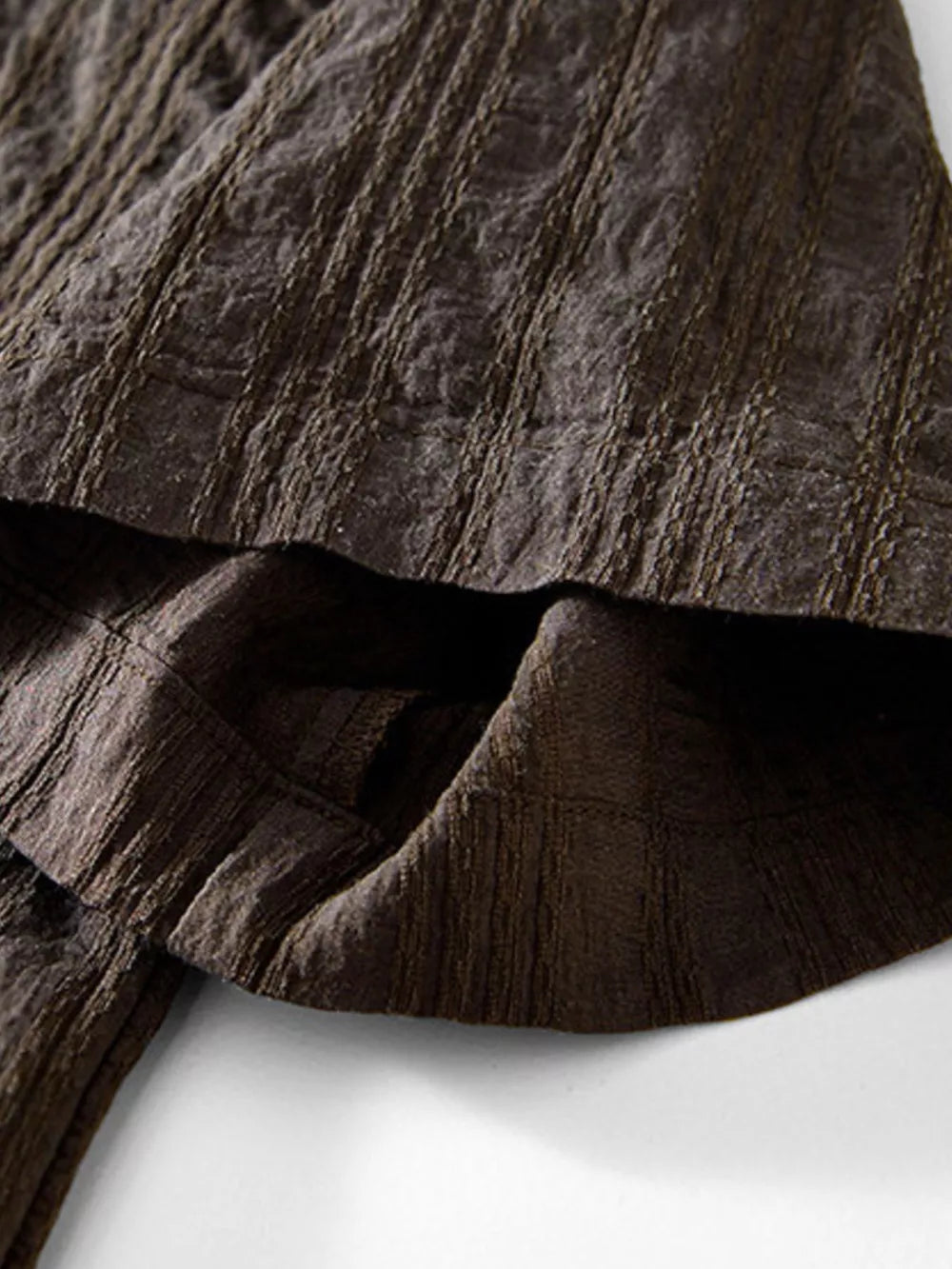 Chocolate textured cotton men's blouse with short sleeves and a subtle grid pattern.