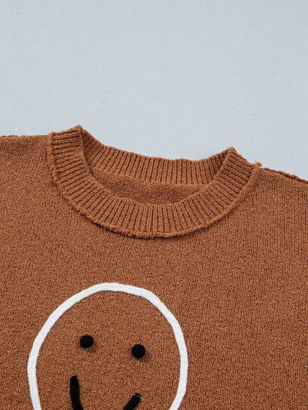 pullover sweater featuring graphic-print in Caramel with 100% polyester Care instructions: Machine wash cold texture