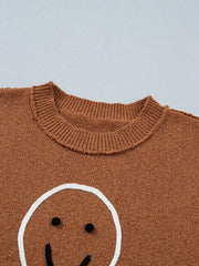 pullover sweater featuring graphic-print in Caramel with 100% polyester Care instructions: Machine wash cold texture